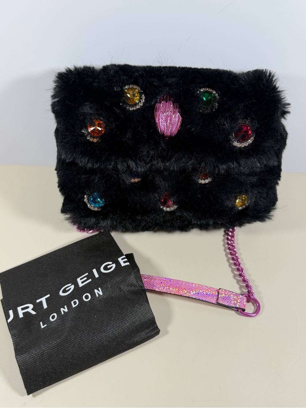 Kurt Geiger Black Faux Fur Jeweled Phone Case with Pink Glitter Chain